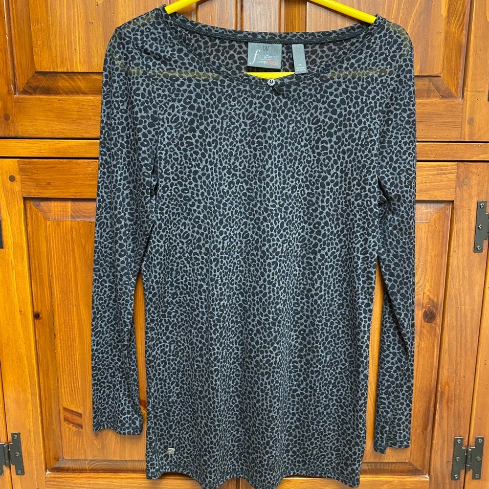 Bundle 10 (4-5$) items for a 10$ offer.Black&White Dotted Tunic Blouse.
